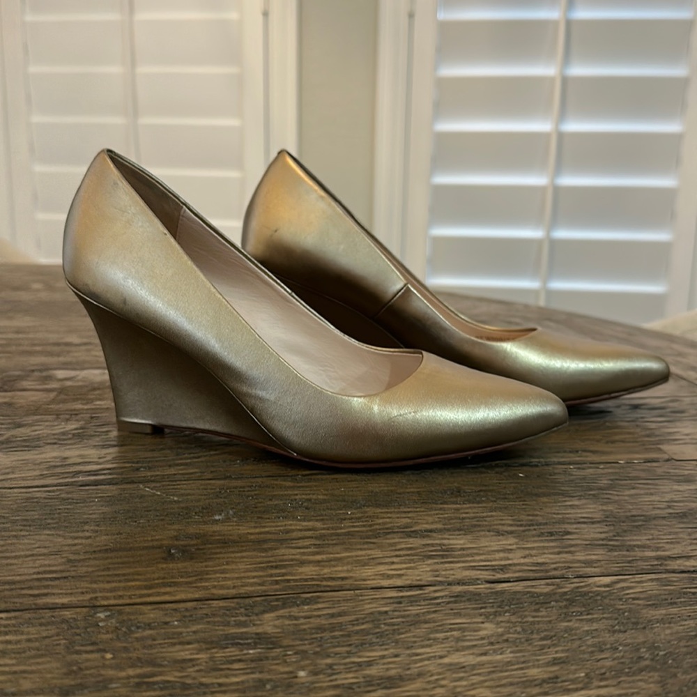 Cole Hasn gold pointed toe wedges